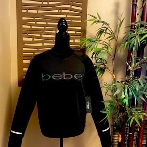 NWT Bebe Scuba Pullover Black Top With Embossed Logo. Women's Large